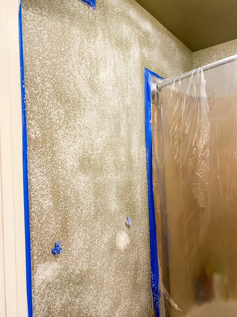 Retexturing a wall during DIY Bathroom Remodel