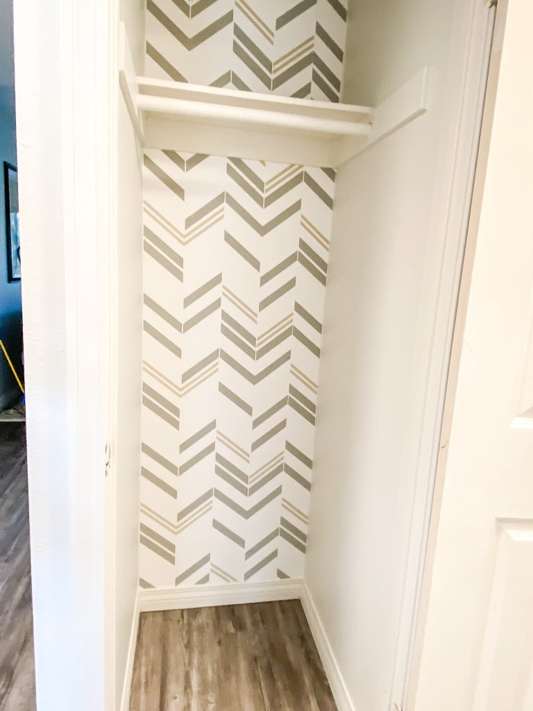 Roomates peel and stick wallpaper chevron in entryway closet